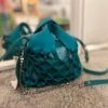 Bolso Nido mini de piel artesanal color turquesa 1