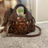 Bolso de piel mini color teja con saca interior de algodón con estampados